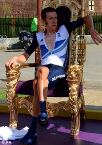 Wiggins sitting on a throne left over from Jordan and Peter Andre's wedding ceremony